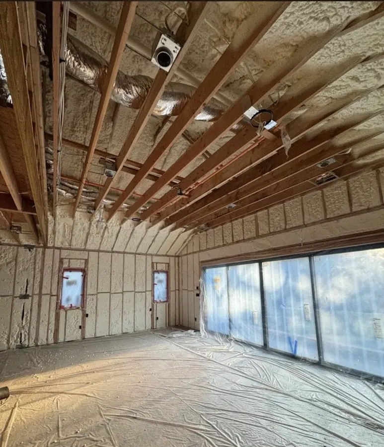 Interior walls and ceiling insulated with spray foam during new construction in Oak Ridge